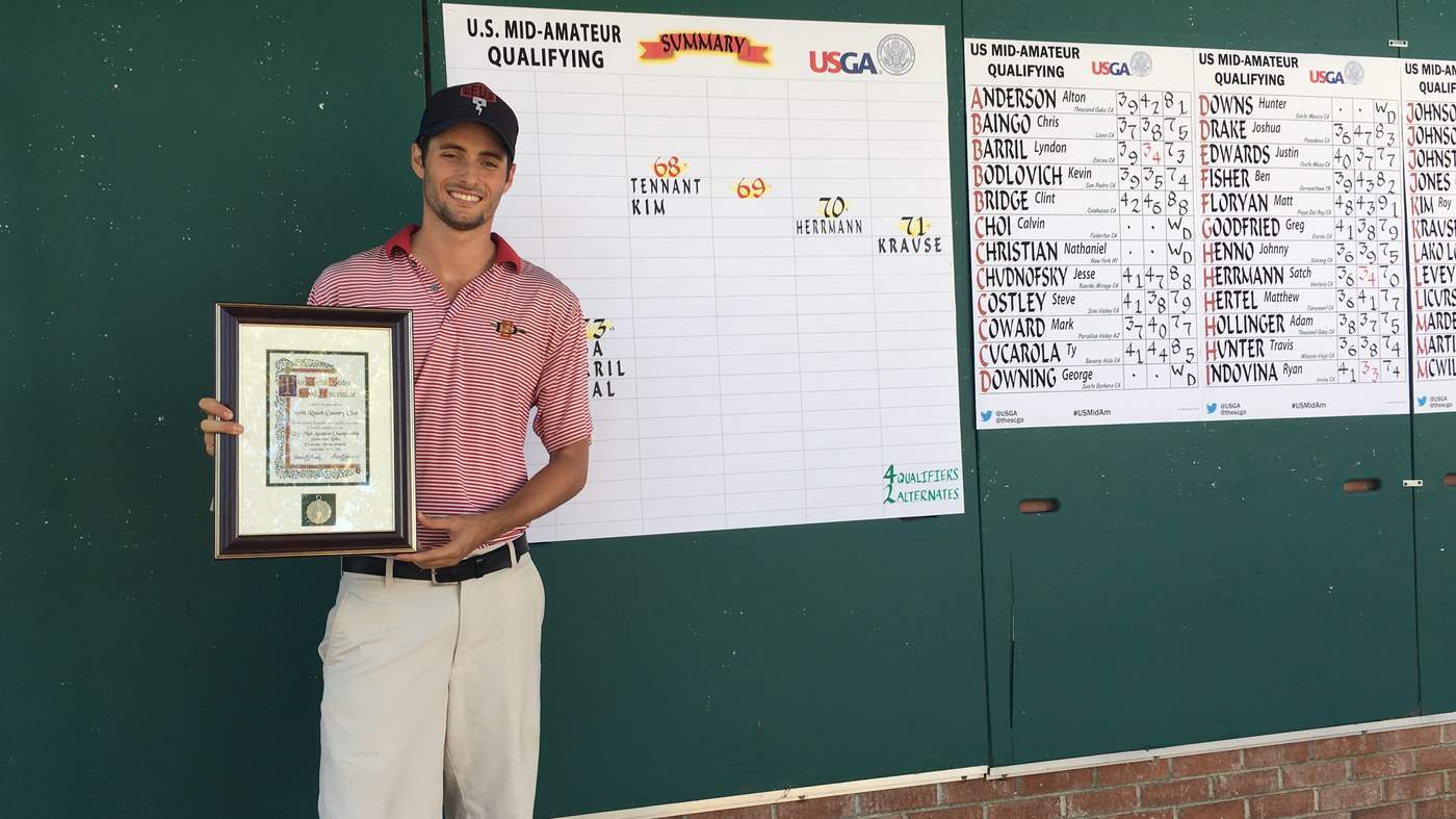Cameron Tennant holding his framed USGA qualifying certificate in front of the U.S. Mid-Amateur qualifying summary board, with TENNANT and the score 68 at the top of the leaderboard